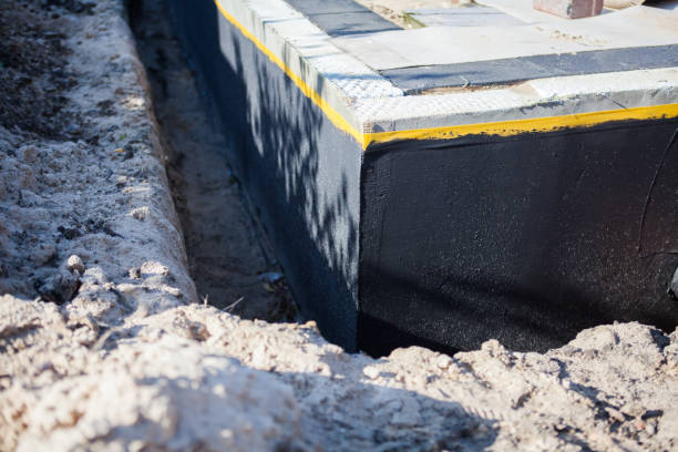 Professional Emergency Waterproofing technician working in Brighton, IL